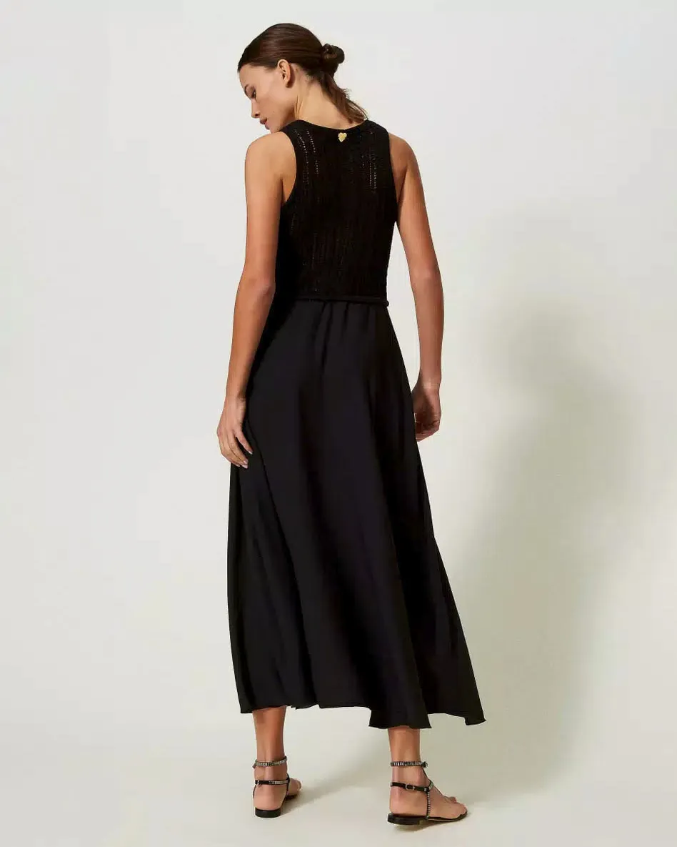 Abito lungo nero con corpetto crochet senza maniche con gonna in viscosa